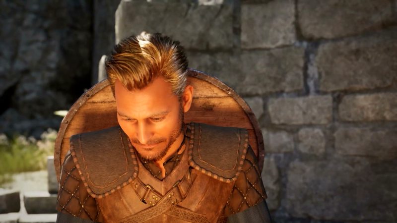 Official Steam teaser trailer frame: close-up of the silver-haired adventurer, head bowed beside a stone wall.